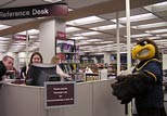 Flash getting help with all of his research needs in the Information Commons.