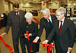 LMS Dean Mark Weber, President Carol A. Cartwright, Don Tolliver, and Provost Paul L. Gaston, participate in a ribbon-cutting ceremony to symbolize the grand opening of our new Information Commons
