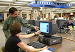 Student Receiving Assistance In Reference