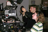 Student employees preparing for a production in Teleproductions' Studio A.