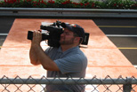 A Teleproductions staff member at Derby Downs in Akron, Ohio capturing the National Super Kids Classic.
