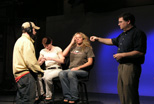 A Teleproductions staff member and student employee preparing for a production in Studio A.