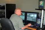 A Teleproductions staff member editing a video on a Media 100 844-X system